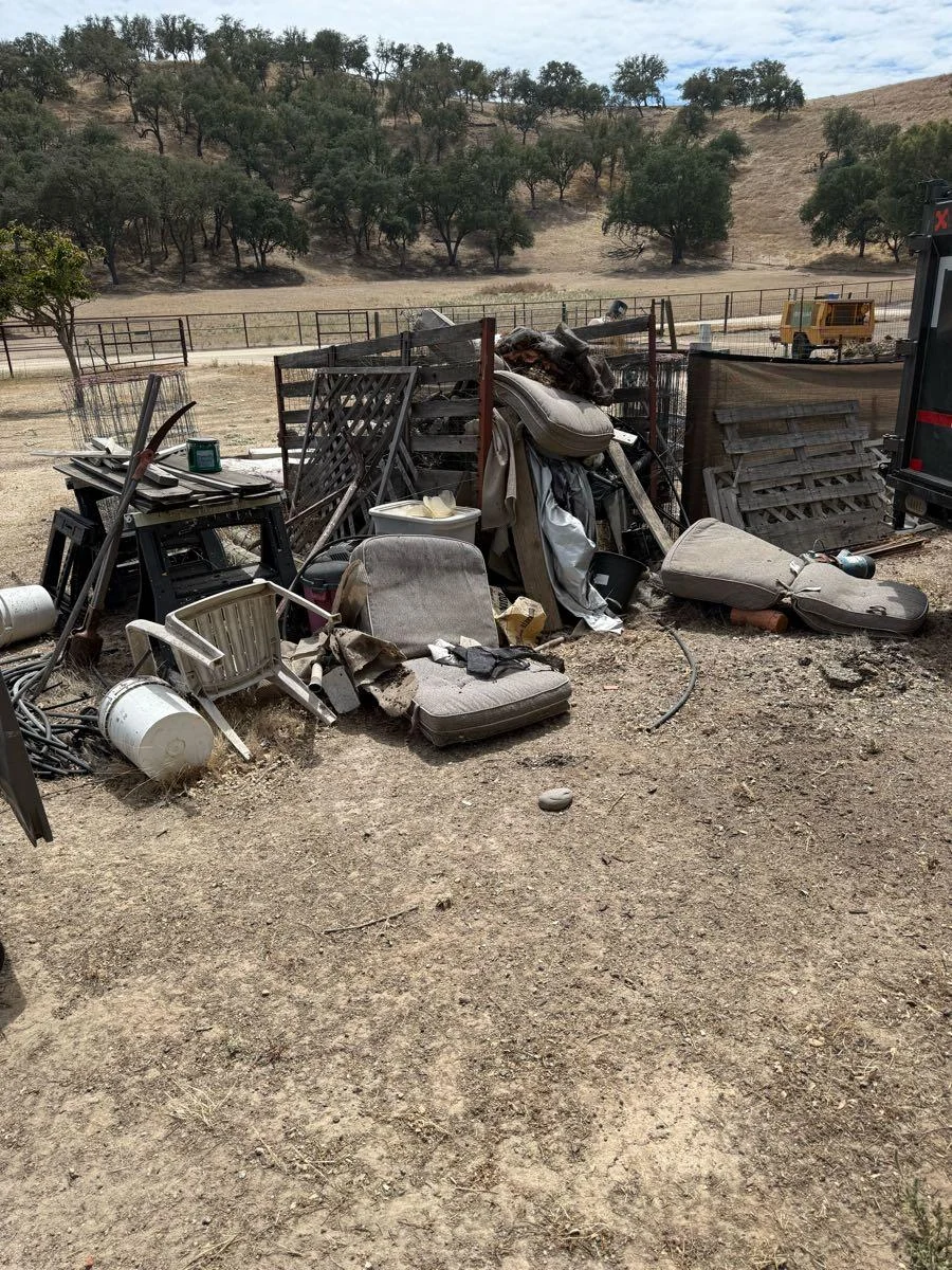 Discarded materials gathered at a rural property